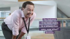 poster-24945-scope-handicapes-bending-over-to-a-wheelchair-user-236x132